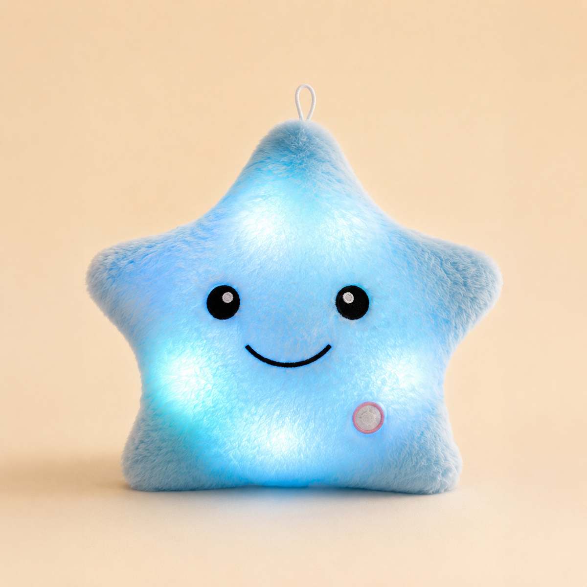 Blue Glowshie light-up star pillow with a soft glow and friendly embroidered face.