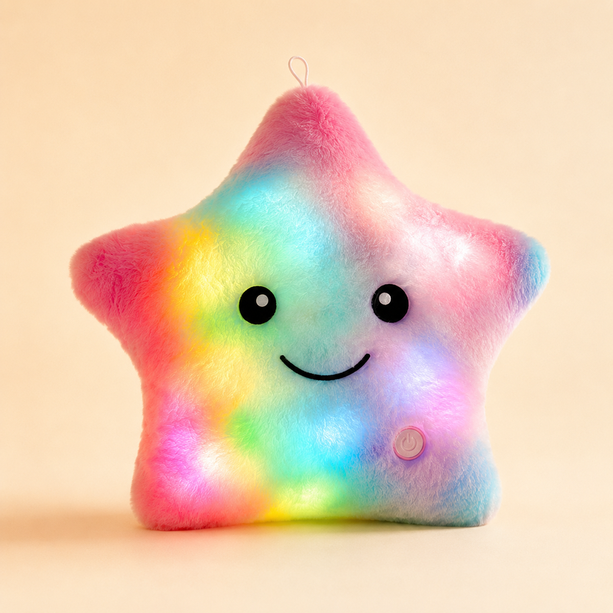 Rainbow Glowshie light-up star pillow with a soft plush finish and smiling face.