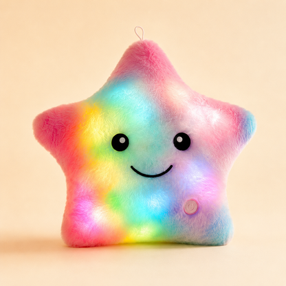 Rainbow Glowshie light-up star pillow with a soft plush finish and smiling face.